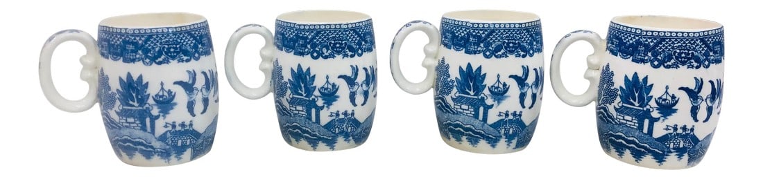 Vintage Blue Pattern Barrel Shaped Mugs - Set of 4: Set of 4 Blue Willow pattern mugs in a barrel shape. Unmarked. All but one have small chips and chiggers on the inner rim. Condition: Alterations: Original Condition Unaltered Imperfections: Some