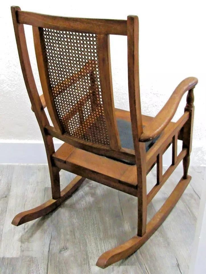 1920s Antique Mission Style Oak Cane Back Black Leather Seat Rocking Chair - 5