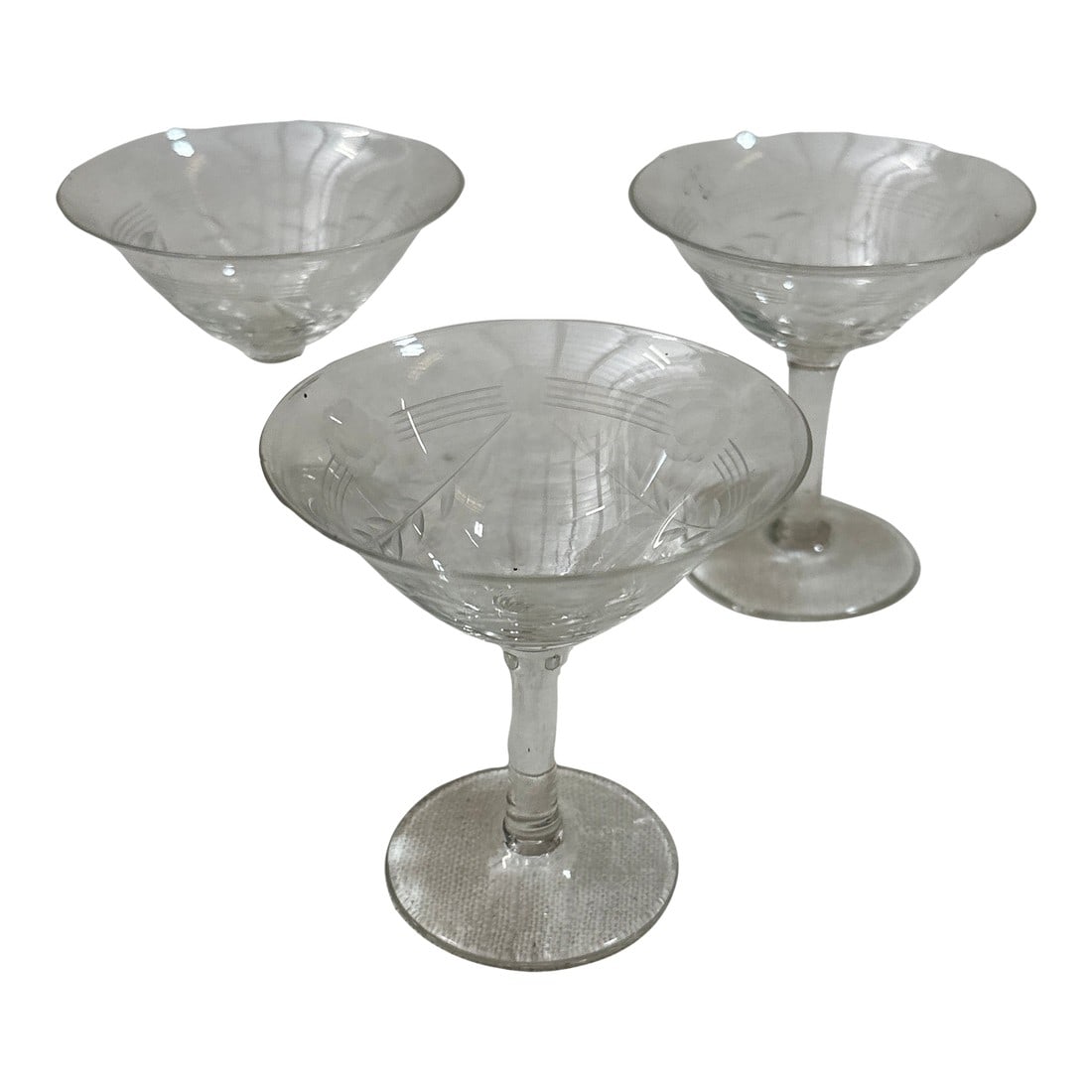 Trio of Small Champagne Glasses With Etched Leaf Details, 1970s: Up for consideration is a beautiful trio of small champagne glasses with etched leaf designs. These would look lovely in your home and they are a great find for the interior design enthusiast. Please