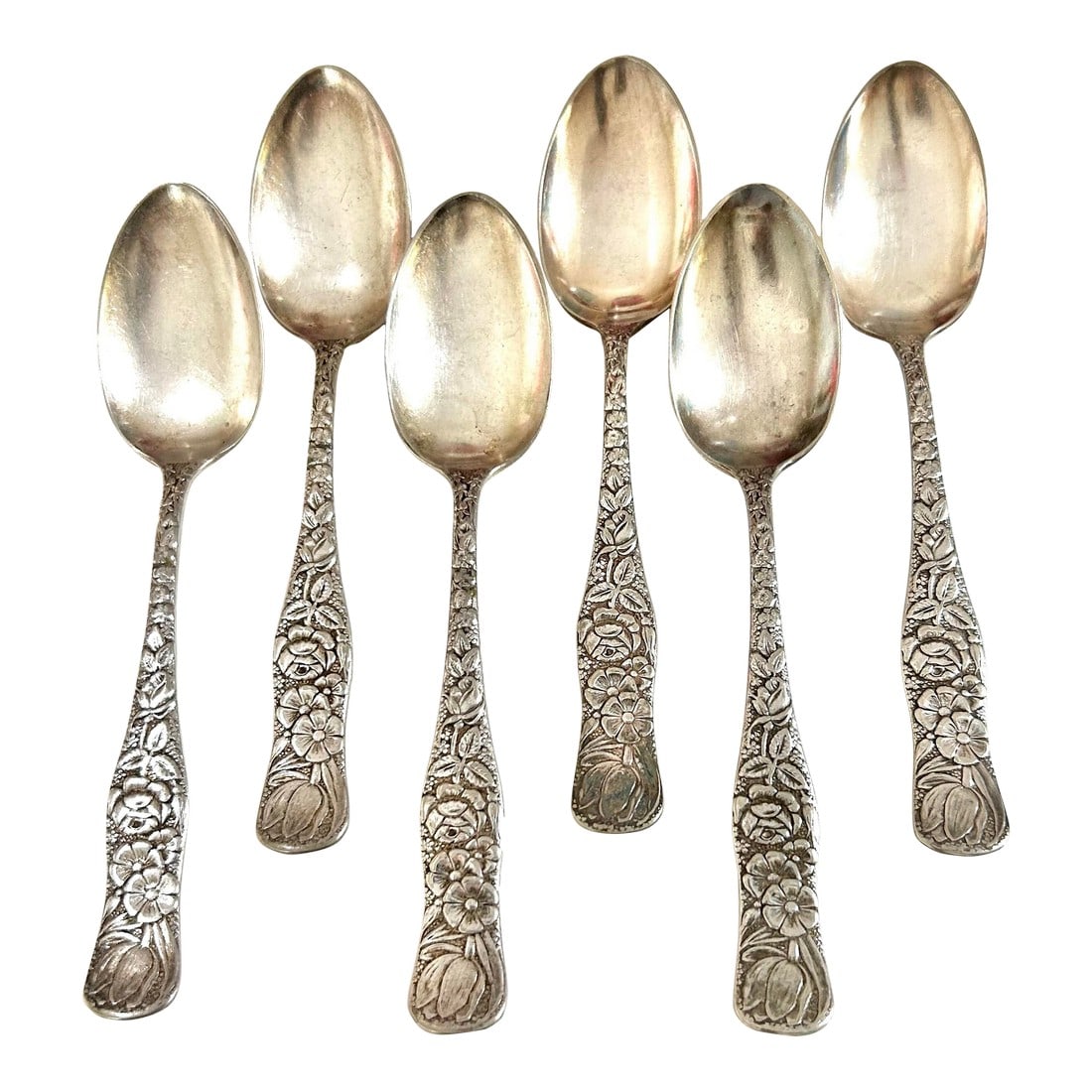 Antique Silver Spoons Holmes Edward's Hiawatha Floral Pattern - Set of 6: This is a very beautiful floral pattern on these silver tea spoons. They're marked Holmes Edwards on the back. I believe they're silverplate. Dimensions 6" long Condition: Alterations: Original