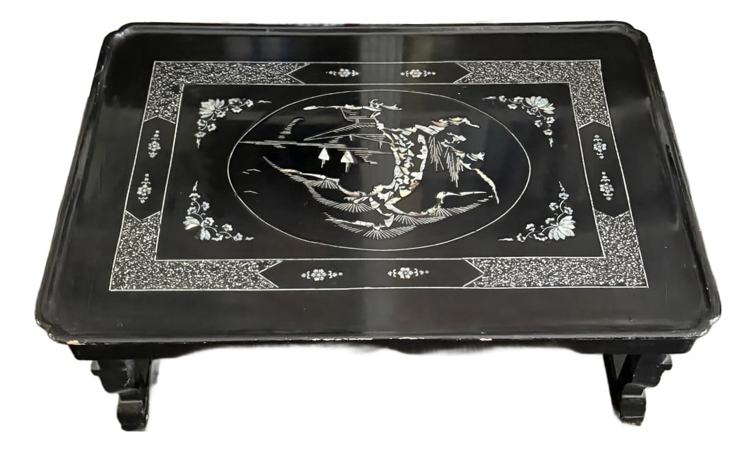 Early 20th Century Low Asian Style Table With Intricate Mother of Pearl Inlay: Low Asian Table with Intricate Mother of Pearl Inlay A low table that would be great used atop a larger table to create height and texture. 28" x 20" x 10.5" Condition: Alterations: Original