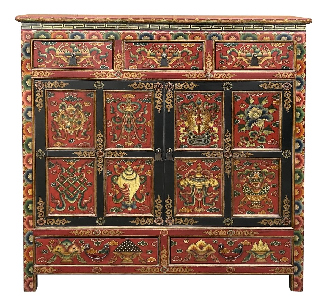 Tibetan Style 8 Auspicious Symbols Graphic Credenza Storage Cabinet: Embrace the rich cultural heritage of the Himalayas with this striking, hand-painted Tibetan cabinet. The vibrant red and black create a bold backdrop for the intricate, symbolic artwork depicting