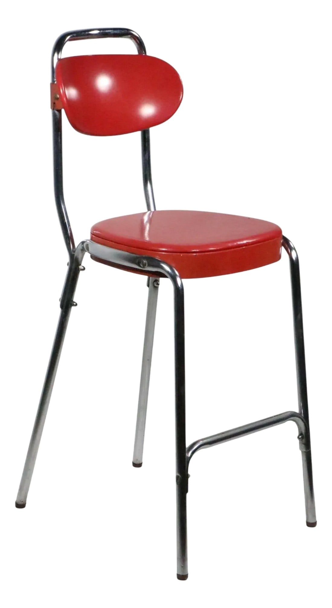 Mid 20th Century VintageMid Century Chrome and Red Counter Stool by Cosco: Cool 1950's vintage counter height stool, by Cosco. The stool features an adjustable cuved back rest, which tilts and can be raised or lowered on the tubular chrome frame. The seat is and back are