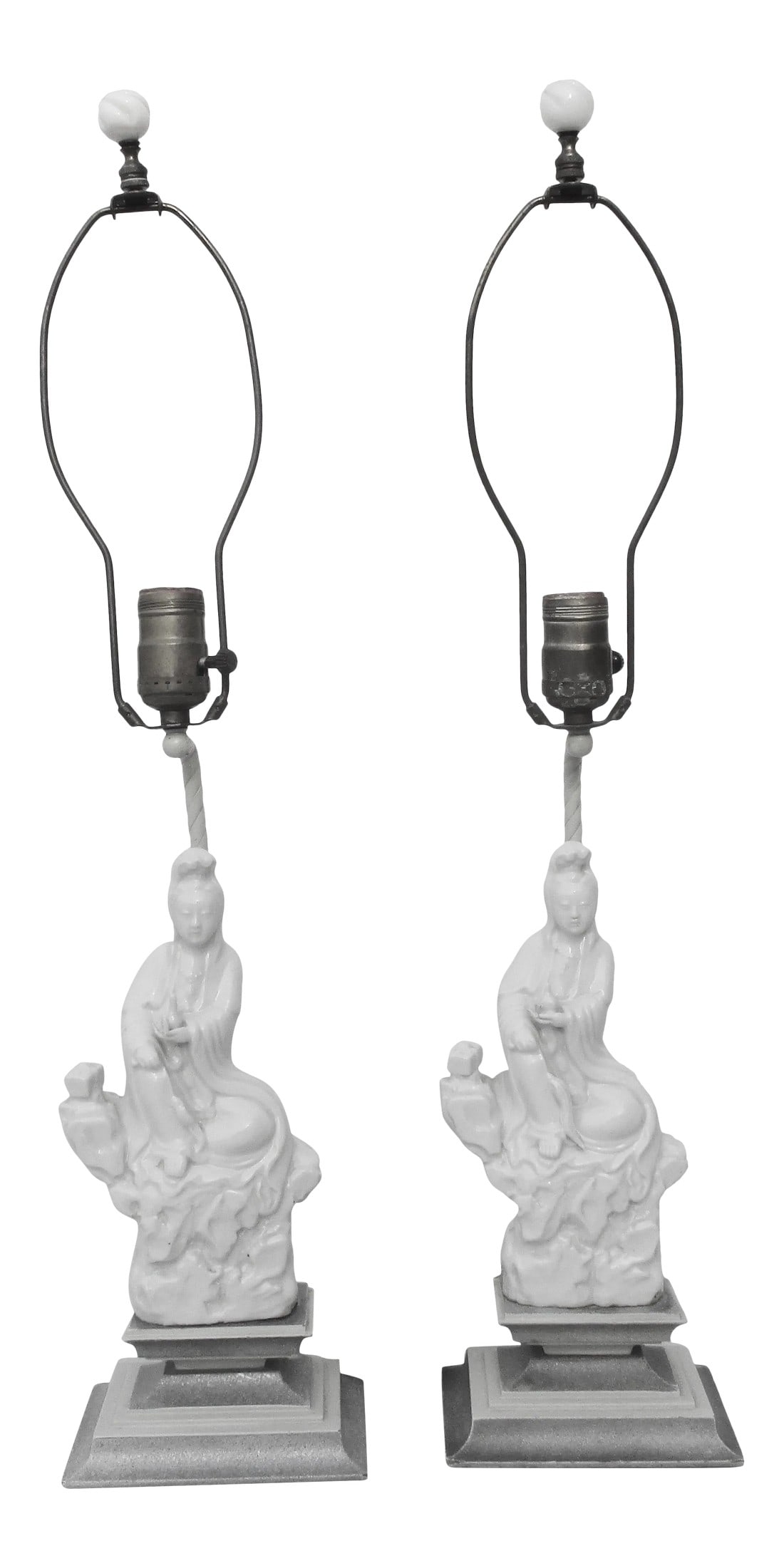 Vintage 1950s Chinese Blanc De Chine Lamps - a Pair: Vintage 50s' Blanc de Chine table lamps. Pair of Kuan Yin on rockwork porcelains mounted on stacked wooden pedestals painted in white and silver finishes. Wired through a brass rod attached to the