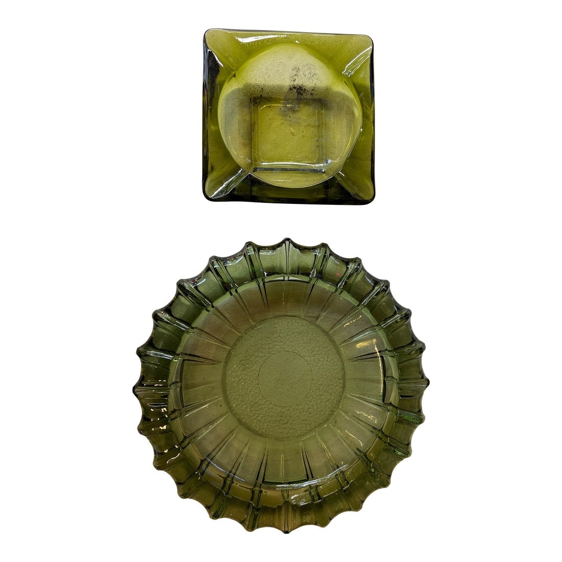 Pair of Vintage Green Glass Ashtrays: Up for consideration is a beautiful pair of green glass ashtrays. These would look lovely on display in your home and they are a great find for the interior design enthusiast. Please check out my othe