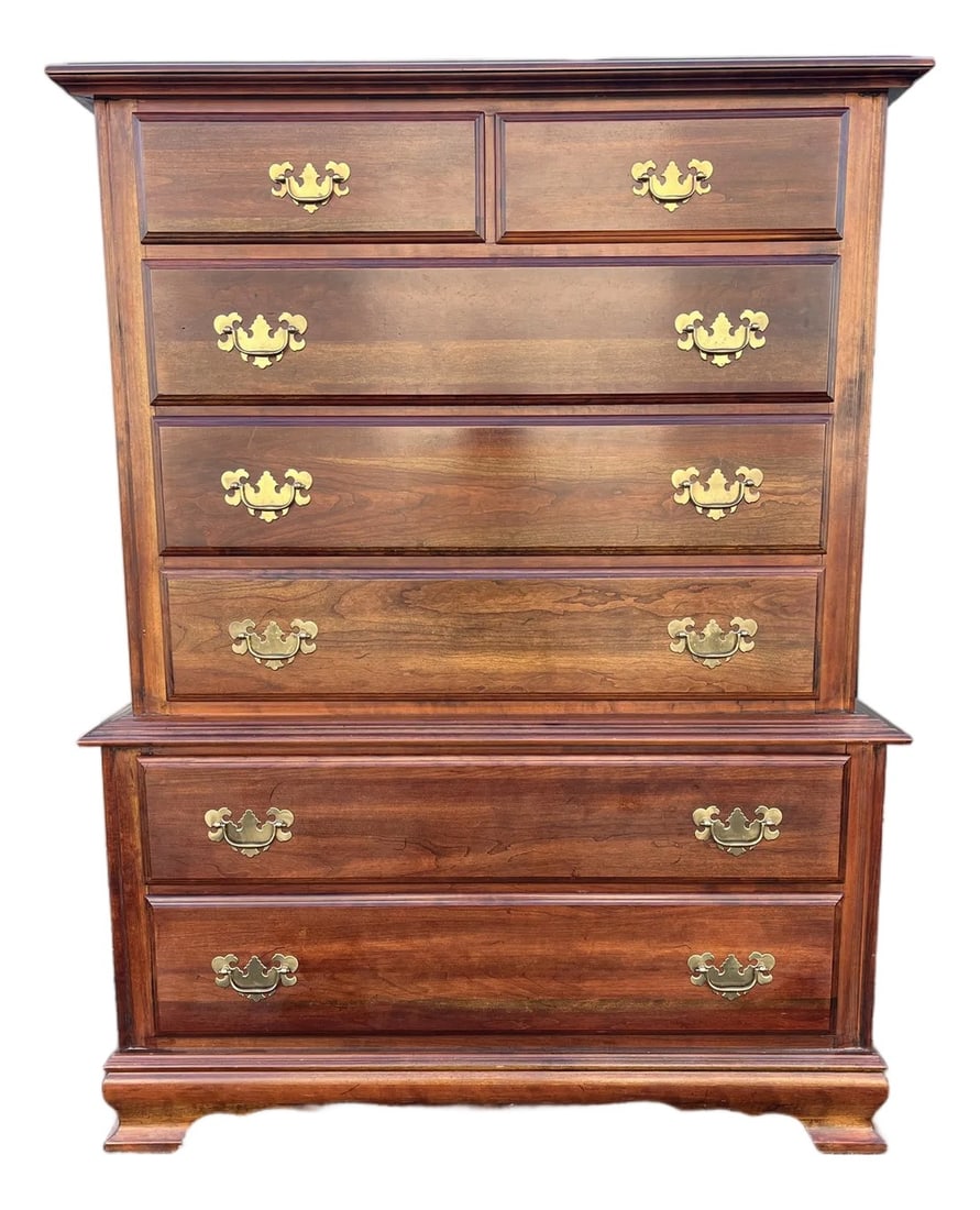 1970s Cresent Furniture 7-Drawer Cherry Chippendale Tall Chest of Drawers: American made by Cresent Furniture, this beautiful solid cherry tall chest of drawers is a testament to high quality craftsmanship and visual beauty. This piece features five stacked drawers and two h