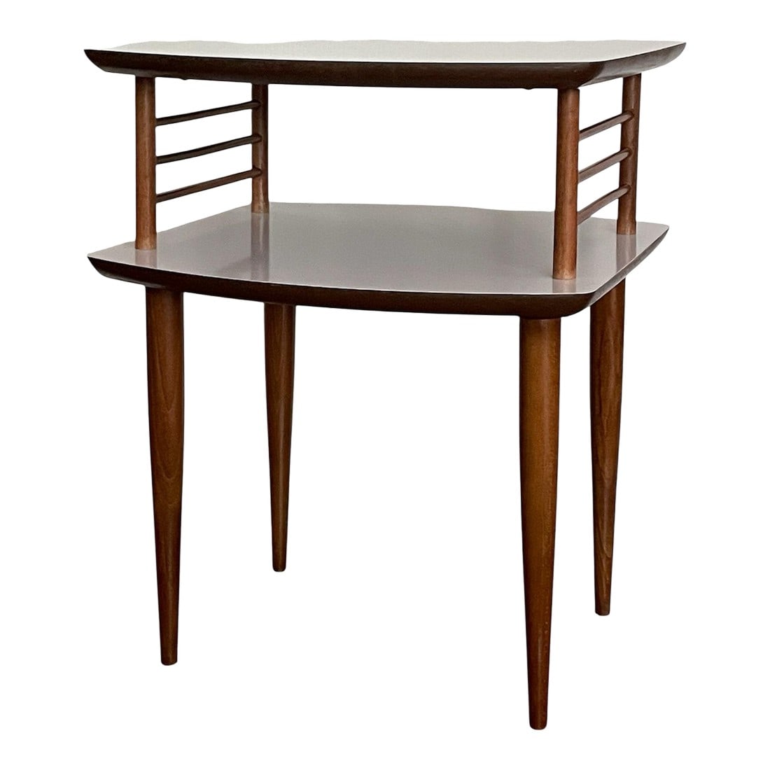 1950s Mid Century Modern Formica Accent Table: A stunning representation of Midcentury modern design. Formica table top with multi level tops. Midcentury modern tapered legs round it out. Condition: Alterations: Original Condition Unaltered Imperf