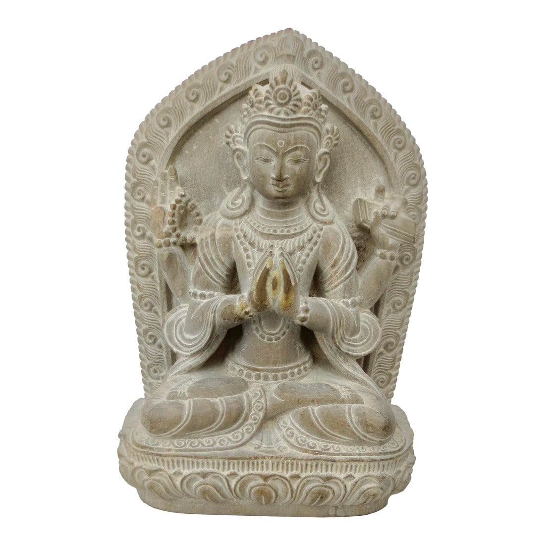 Limestone Chenrazi Buddha Nepali: Beautifully handcarved limestone grey Carving of the Chenrazi Buddha. Four-armed and in the lotus position. Beautifully carved image of the classic central figure of the Buddhist Temple. The