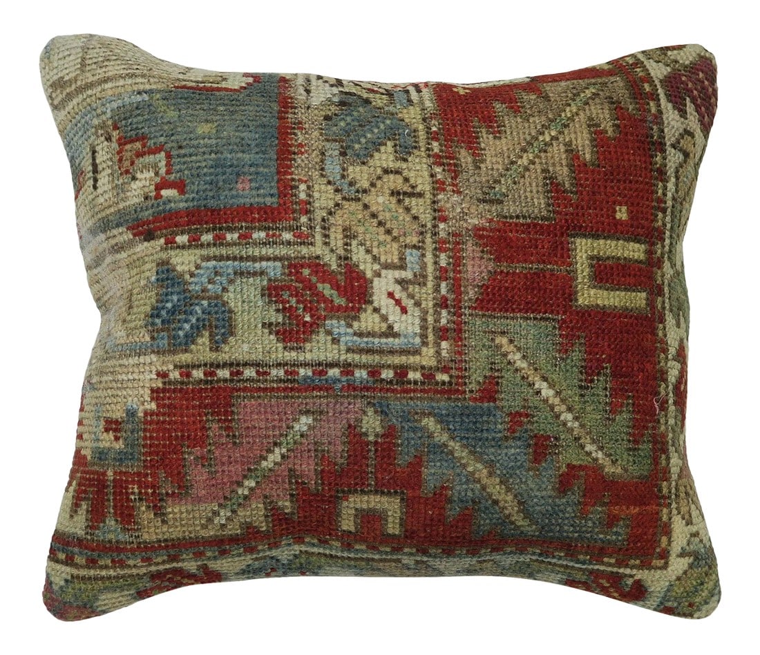 Rustic Tribal Border Pillow: Pillow made from an early 20th century Caucasian Rug. Zipper closure and foam insert provided. 13'' x 17'' Condition: Alterations: Original Condition Unaltered Imperfections: Some Imperfections Condit
