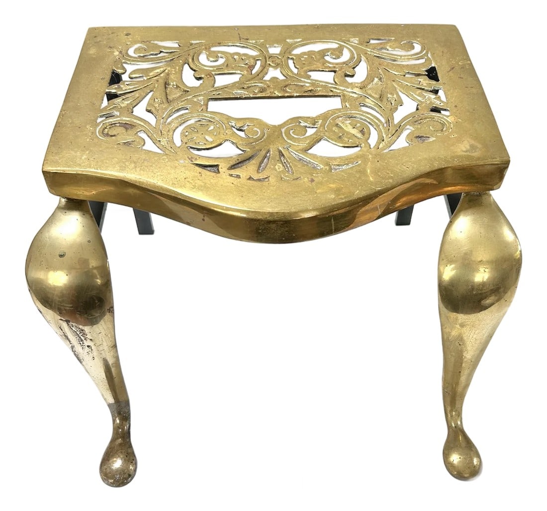 19th Century English Scrollwork Brass & Iron Footman With Cabriole Legs Footstool: A very handsome piece with many uses. It would be great in a library in place of a ladder. It features cabriole front legs and pierced, reticulated leaf pattern design on the top. Dimensions 16.25"