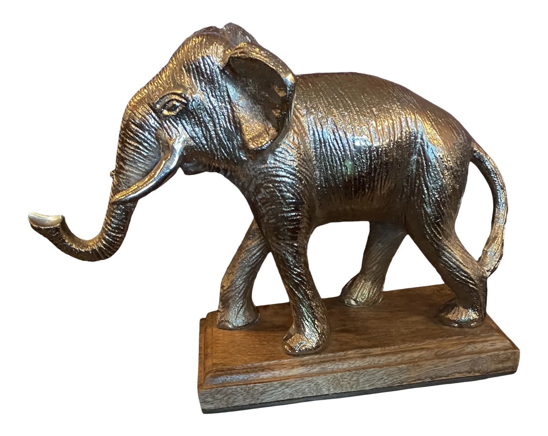 Silver Plated Metal Elephant: Metal Silver Plated Elephant on a Wood Base and beautifully detailed and intricate. Condition: Alterations: Original Condition Unaltered Imperfections: Some Imperfections Condition Notes: Great Shape