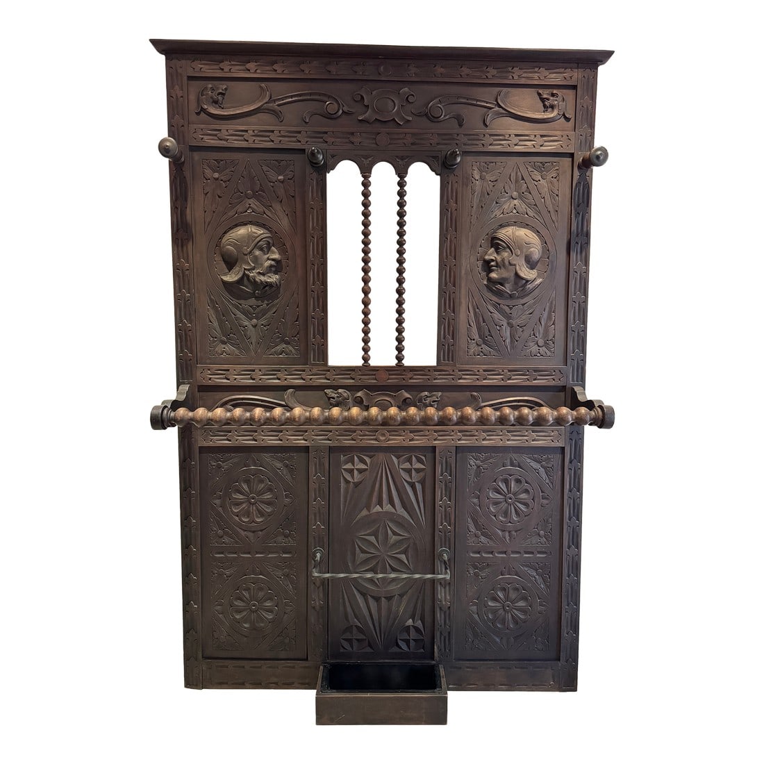 Entrance Hall Tree/Coat Rack/Umbrella Stand, 19th Century French Gothic Revival: Striking 19th-century French Gothic Revival entrance hall tree crafted in richly carved oak. This stately piece features intricate tracery, curved arches, and spiraled columns emblematic of the Gothic