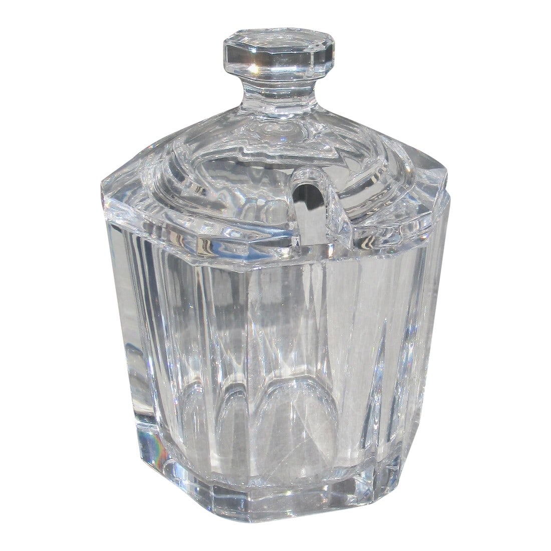 Orrefors Crystal Sugar Jar: Orrefors crystal sugar bowl attributed to the designer Olie Aberius.( Orrefors 1971-1993) .Heavy crystal with thick walls and a notched lid for the spoon. Hexagon shape with beveled corners. Marked Or