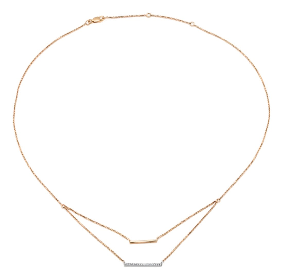 1990s 14k Yellow White Gold Delicate Diamond Bar Layered Necklace: Elevate your jewelry collection with this chic 14K Yellow and White Gold Diamond Bar Layered Necklace, perfect for fashion-forward layering and everyday sophistication. Crafted in a harmonious blend