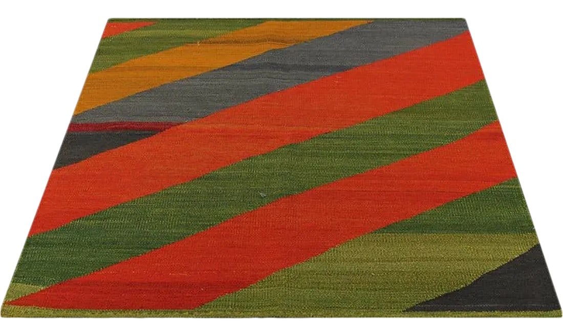 Handwoven Scandinavian Style Persian Kilim Rug3'1" X 3'3": This remarkable Scandinavian style kilim rug features a dramatic pop of electrifying colors in a playfully rich design. The innovative modern use of colors certainly brings a tantalizing element of