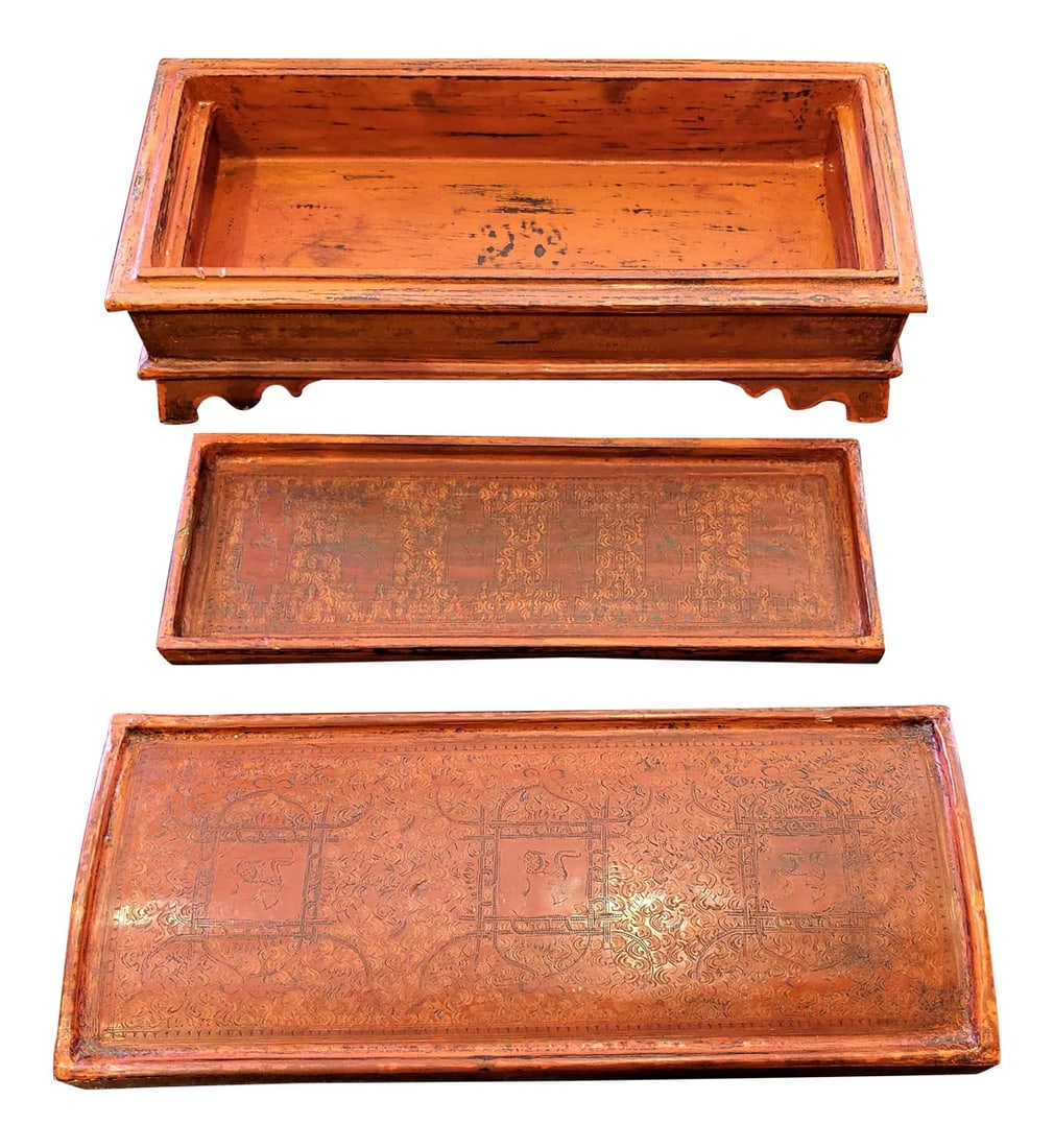 Antique Indonesian Wood Polychromed and Lacquered Box: Antique hand-painted and lacquered wooden box with removable tray, from Indonesia. The interior compartments are amply sized. There are some small spots where the paint has come off to reveal the
