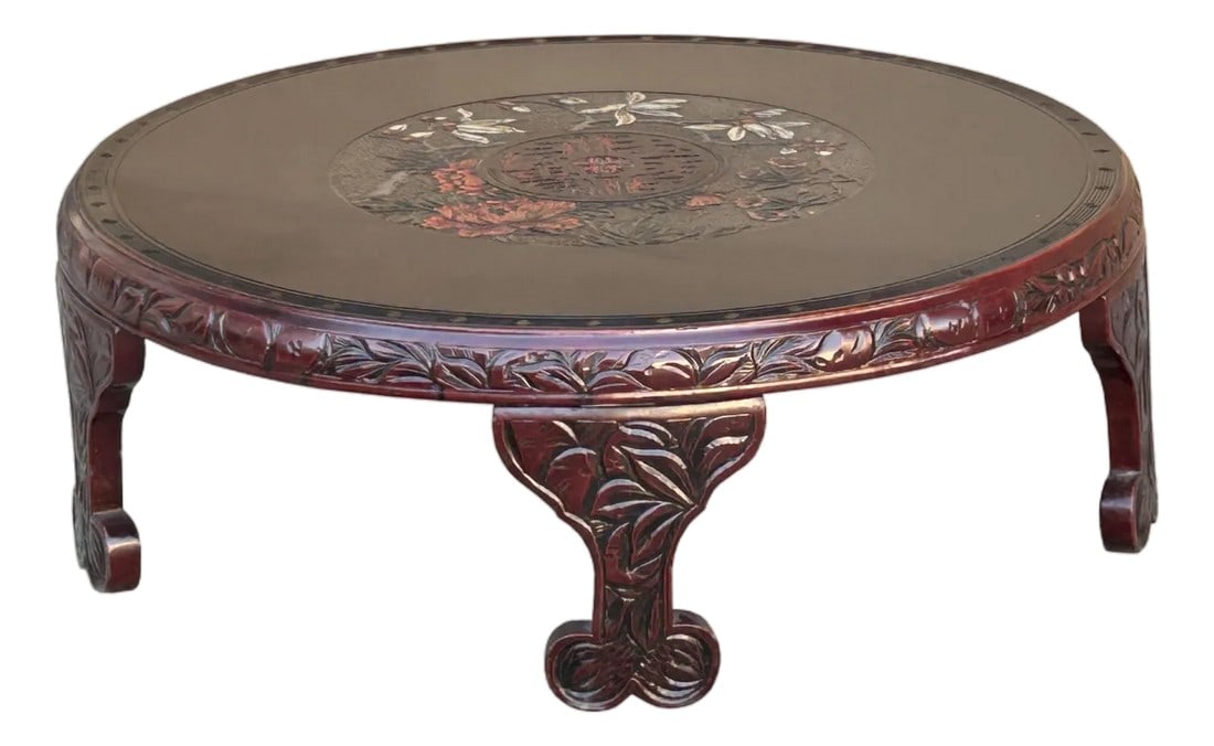 Vintage Brick Red Relief Carving Round Wood Low Kang Coffee Table: Elevate your living space with this stunning, handcrafted Oriental low table, a true masterpiece of traditional craftsmanship. Its deep, lustrous, reddish-brown lacquer finish beautifully highlights t