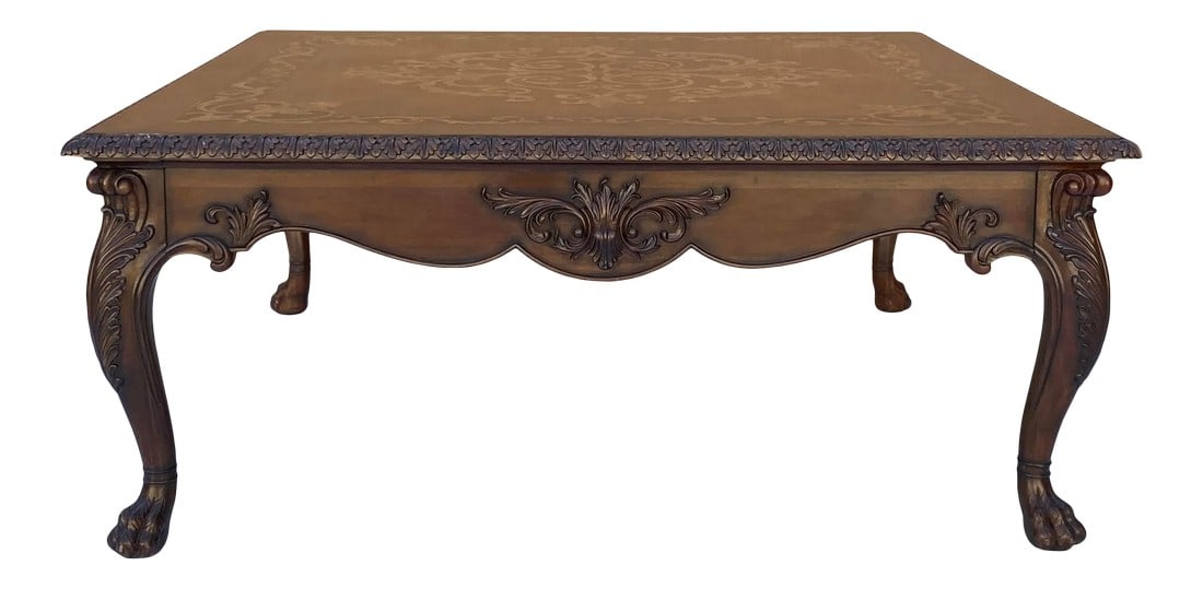 Square Western Claw Legs Veneer Pattern Coffee Table: This is a square coffee table made of wood and a veneer pattern on the top. The legs are in claw shape with a dimensional carving accent. Dimensions: w50" x 50" x h21.5" Origin: USA