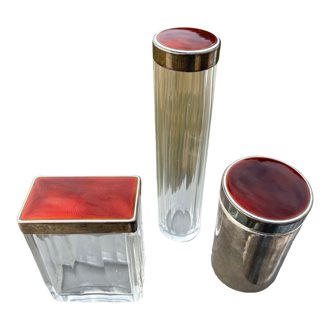 19th C. Red Guilloche Enamel, Sterling and Crystal Vessels - Set of Three: A Truly Beautiful Trio. Exceptional 19th C. Enamel, Sterling silver and crystal Vanity Set. Set of three fragrance / powder / oil bottles in faceted crystal, with the most remarkable enamel on