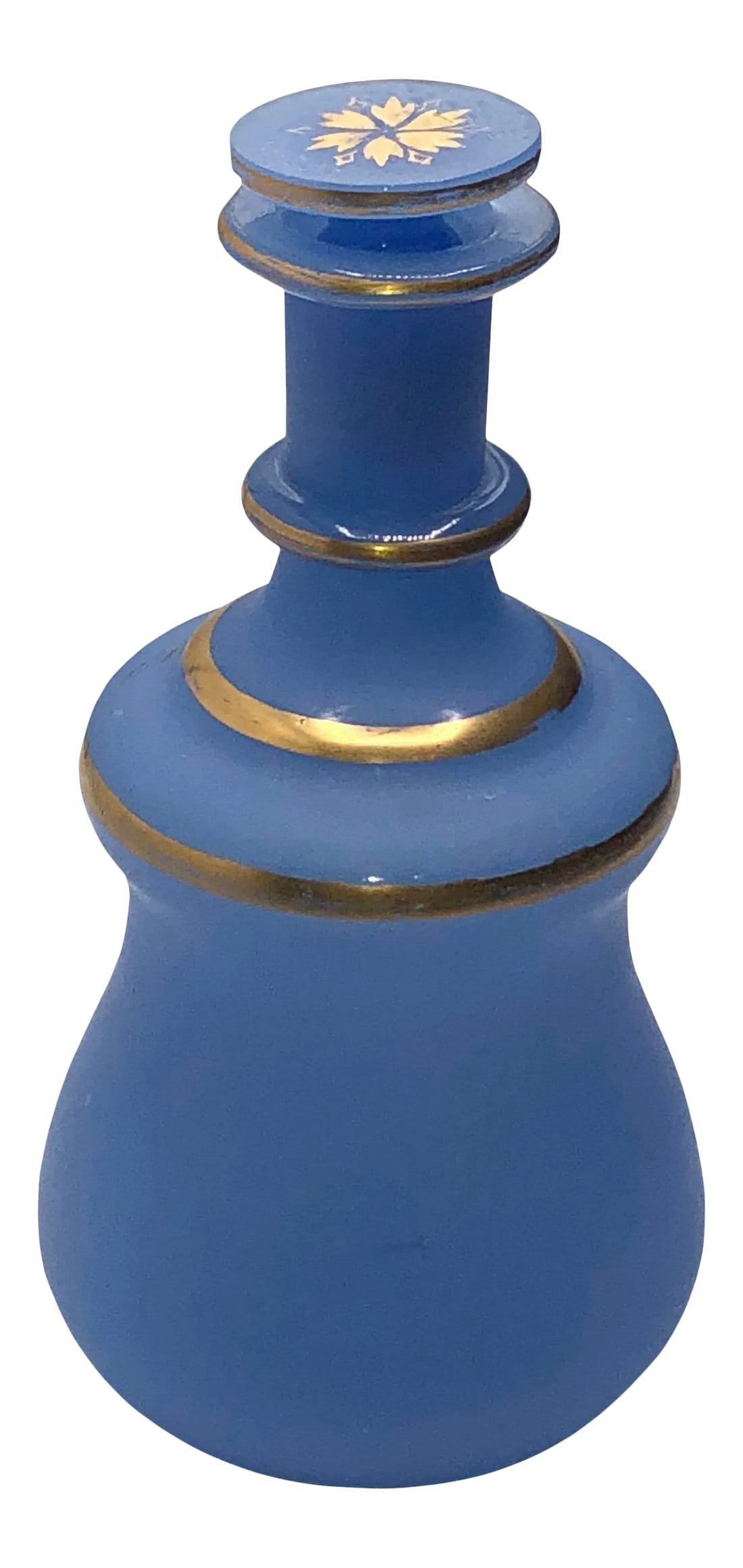 Antique French Blue Opaline Decanter: A lovely French blue decanter with gilt bands and a floral design on top of the original stopper. Condition: Alterations: Original Condition Unaltered Imperfections: Some Imperfections Condition Notes
