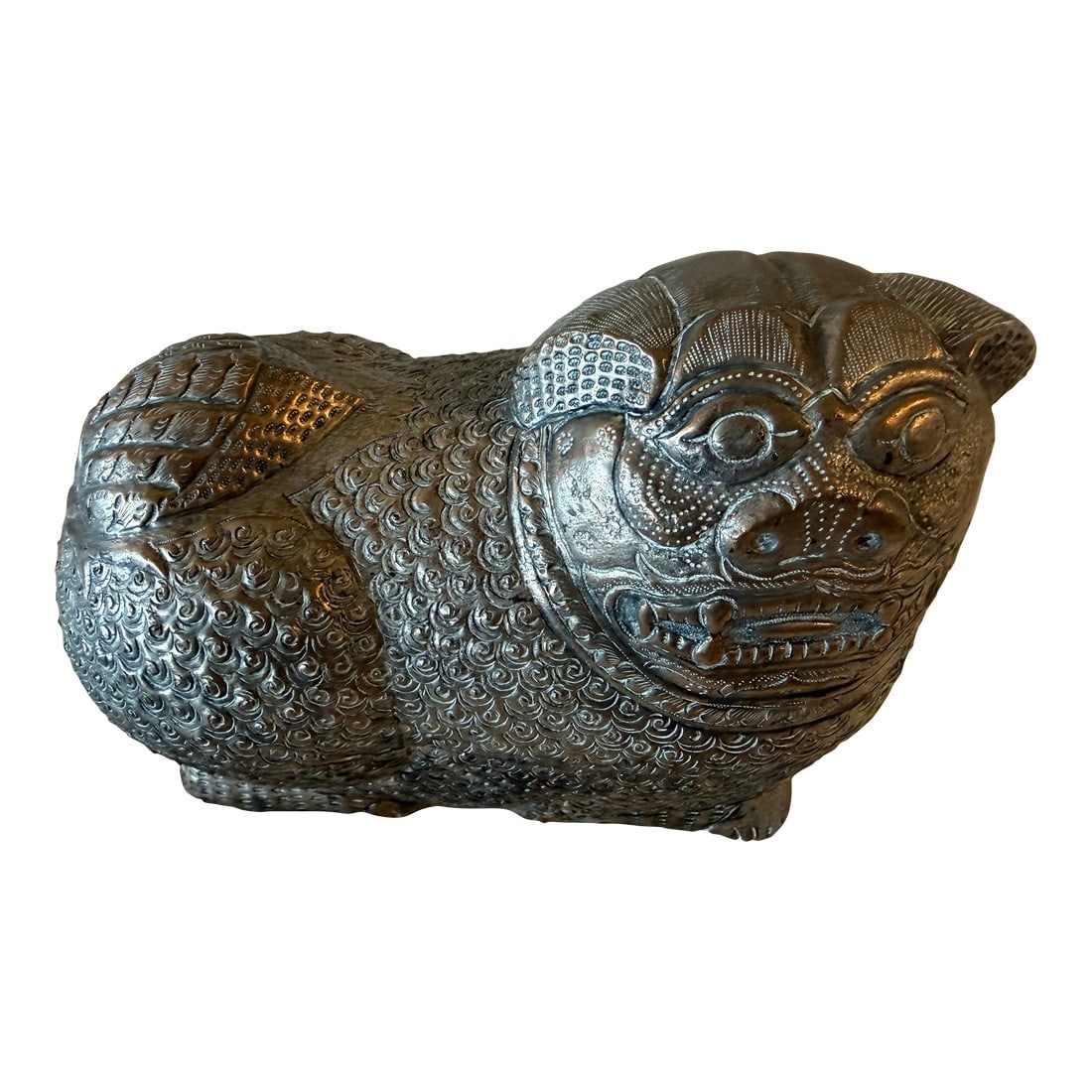 Large Antique Cambodian Silver-Plated Foo/Fu Dog Box: Large antique Cambodian silver-plated foo dog/lion featuring engraved surface details and sculptural ornamentation. The figure displays traditional guardian-lion styling with strong decorative presenc