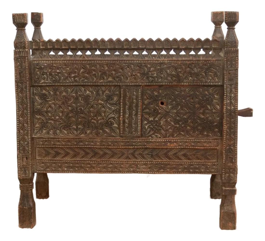 Antique Finely Carved Swat Valley Chest Cabinet: A masterpiece of tribal artistry, this chest hails from the Swat Valley region of Northern Pakistan. Crafted from dense, aromatic Himalayan Cedar, it features the region's signature deep-relief carvin