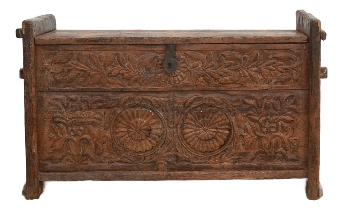 Antique Swat Valley Carved Chest Console: Hailing from the mountainous Swat Valley region, this sturdy chest was traditionally used as a "dowry box" to store valuable textiles, jewelry, and family heirlooms. Crafted from dense Himalayan Cedar
