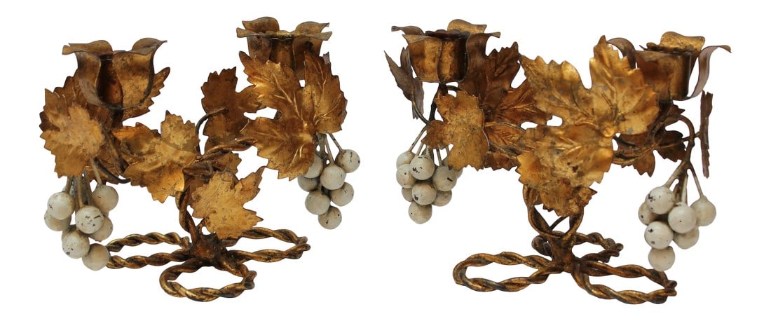 Pair of Vintage Italian Gilt Tole Florentine Grapeleaf Candleabra: Pair of striking circa 1970s Italian candleholders in gilt tole with grapeleaf and grape motif. Each sconce holds two candles. Nice patina / age-appropriate wear to the gilt. Height: 5.5 in. Width: 8