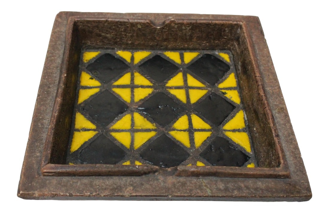Italian Modern Ceramic Ashtray With Diamond Motif Designed by Aldo Londi for Bitossi: Aldo Londi for Bitossi ceramic ashtray / catch-all in faux bois brown matte glaze with vibrant yellow and black diamond inset tile. Striking piece with unique color and textural combinations. Light we