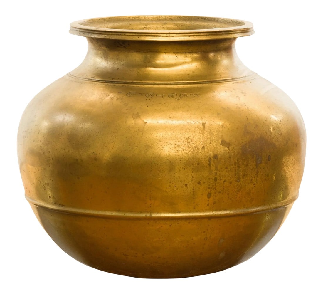 Indian 19th Century Brass Water Jug with Incised Calligraphy: An Indian antique brass water jug from the 19th century, with calligraphy. Created in India during the 19th century, this brass water jug features a generous circular tapering belly accented with inci