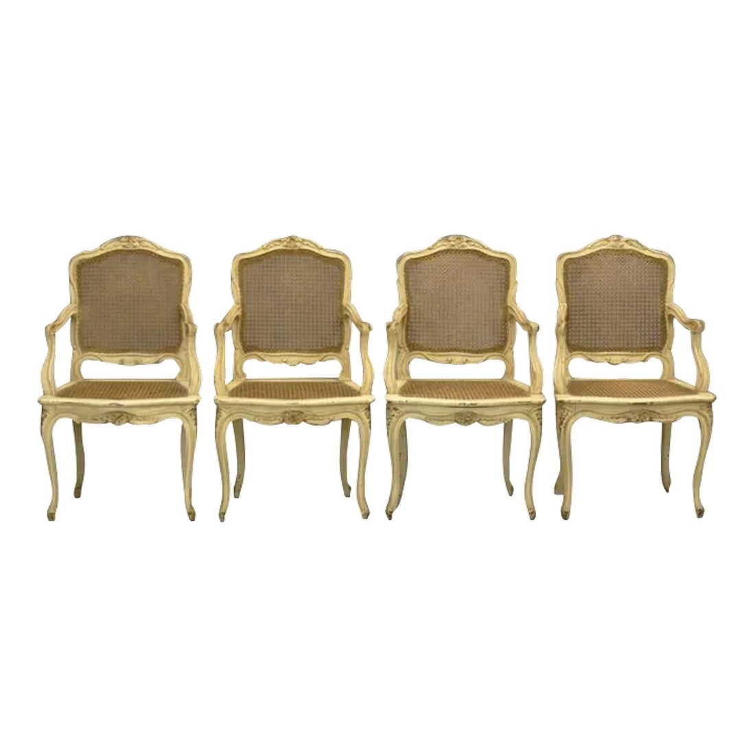 1920s Vintage Louis XV-Style French Caned Arm Chairs - Set of 4: Timeless, elegant, simple, and adaptable, Irwin and Lane's vintage Louis XV-style dining chairs would look just as lovely at a table in the same period style or around a Saarinen tulip table "”