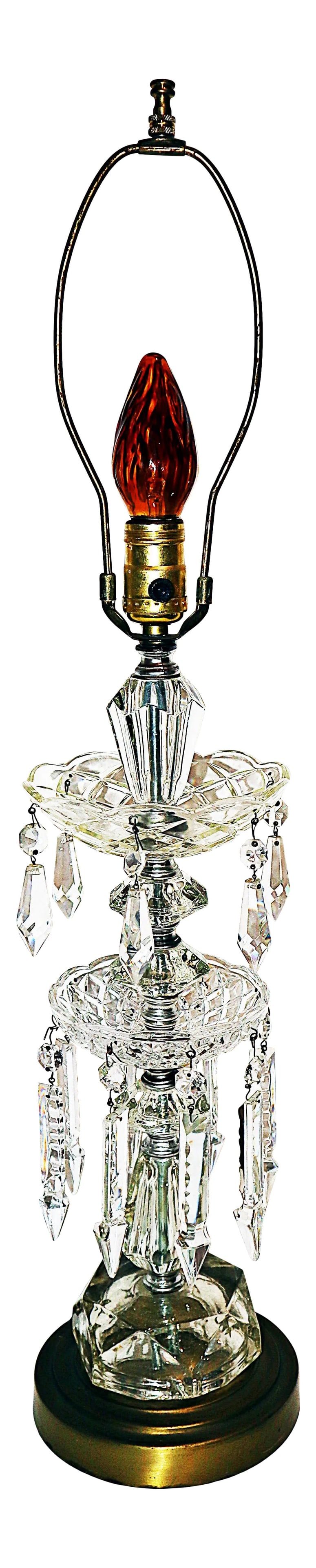 Hollywood Regency Crystal Table Lamp: Sparkle and glam with the Hollywood Regency 1940s glass and crystal table lamp. Backcut icicle prisms and teardrop pendants circle the poured crystal bowls. Wired and working for a single Edison based