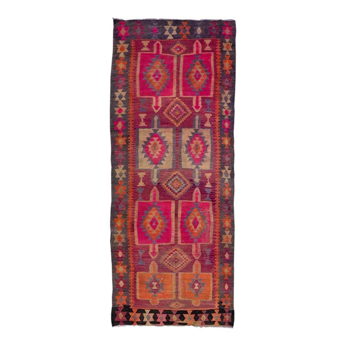 Pink Vintage Kilim Handmade Flatweave Geometric Motif Wool Runner: Beautiful kilim handmade wool runner with a pink field. This Vintage flatweave rug has orange, gray, and brown accents feature a gorgeous all-over tribal design. This rug measures: 4'8" x 11'7". 