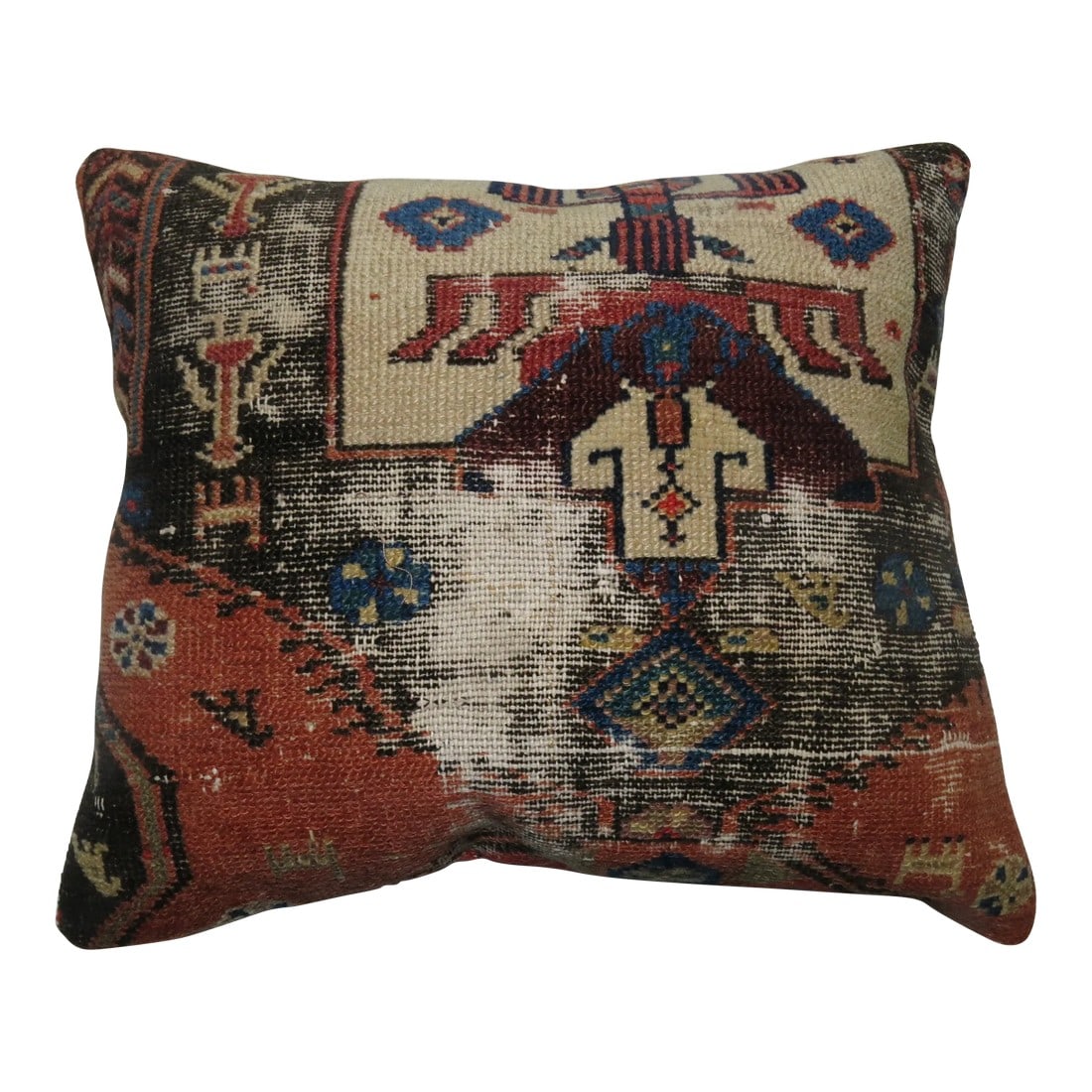 Worn Antique Rug Pillow: One of a kind Pillow made from an early 20th century Persian rug with cotton back. Zipper closure and foam insert provided. 16'' x 16'' Condition: Alterations: Original Design Modified Imperfections: