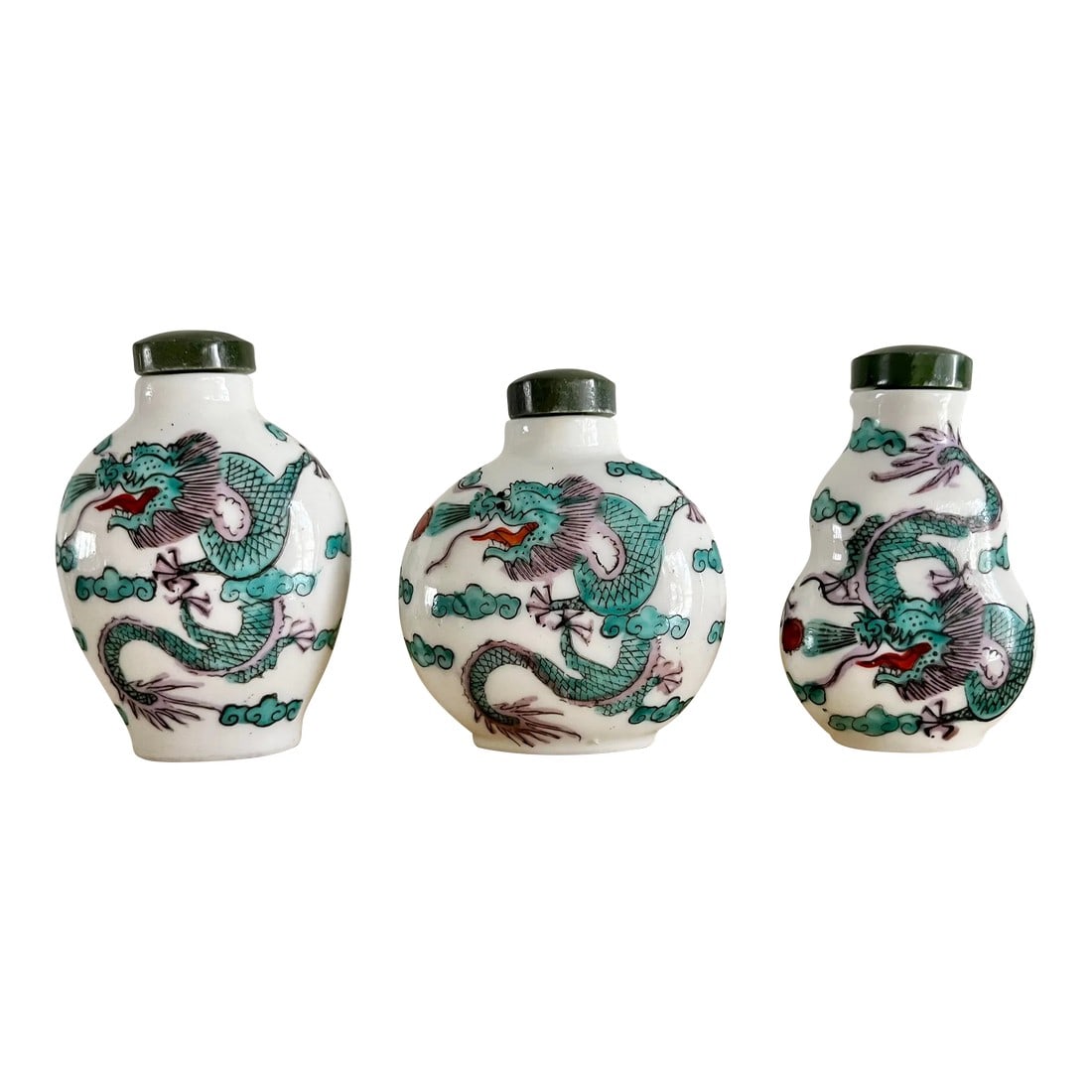 Vintage Chinoiserie Chinese Dragon Porcelain Snuff Bottles - Set of 3: Stunning vintage set of three Chinese porcelain snuff bottles, each featuring a dragon design. These pieces are reminiscent of Schumacher's iconic Chiang Mai Dragon pattern. The bottles are three
