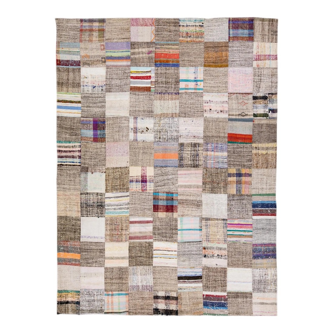 Vintage Multicolor Handmade Patchwork Turkish Wool Rug: Beautiful vintage Turkish hand-knotted wool rug with a brown field. This piece has multicolor accents in a gorgeous all-over geometric patchwork design. This rug measures: 9'2" x 12'3". Condition: