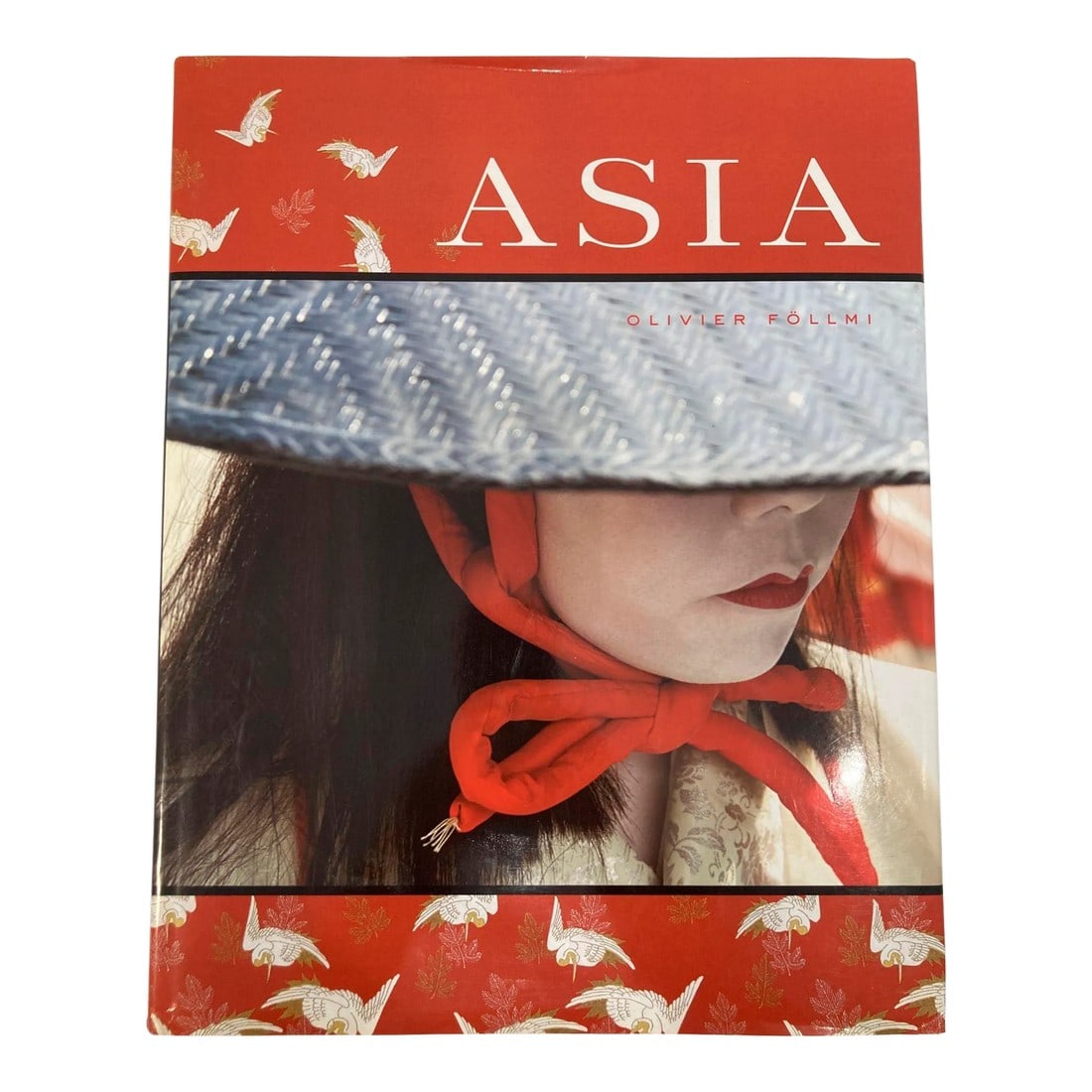 Asia by Olivier Follmi Large Hardcover Book 2008: ASIA by Olivier Follmi Large Hardcover Book. Very large format, heavy coffee table book, beautiful. Inspired by the beauty of distant countries, Asia celebrates the depth and grandeur of the Far