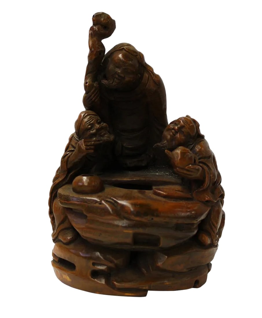 Chinese Bamboo Carved Sculpture: This is a collectible and decorative oriental sculpture depicting 3 old men figure carved from a natural bamboo plant. There are precise details on the facial expression. Dimensions: Dia 5" x 8"