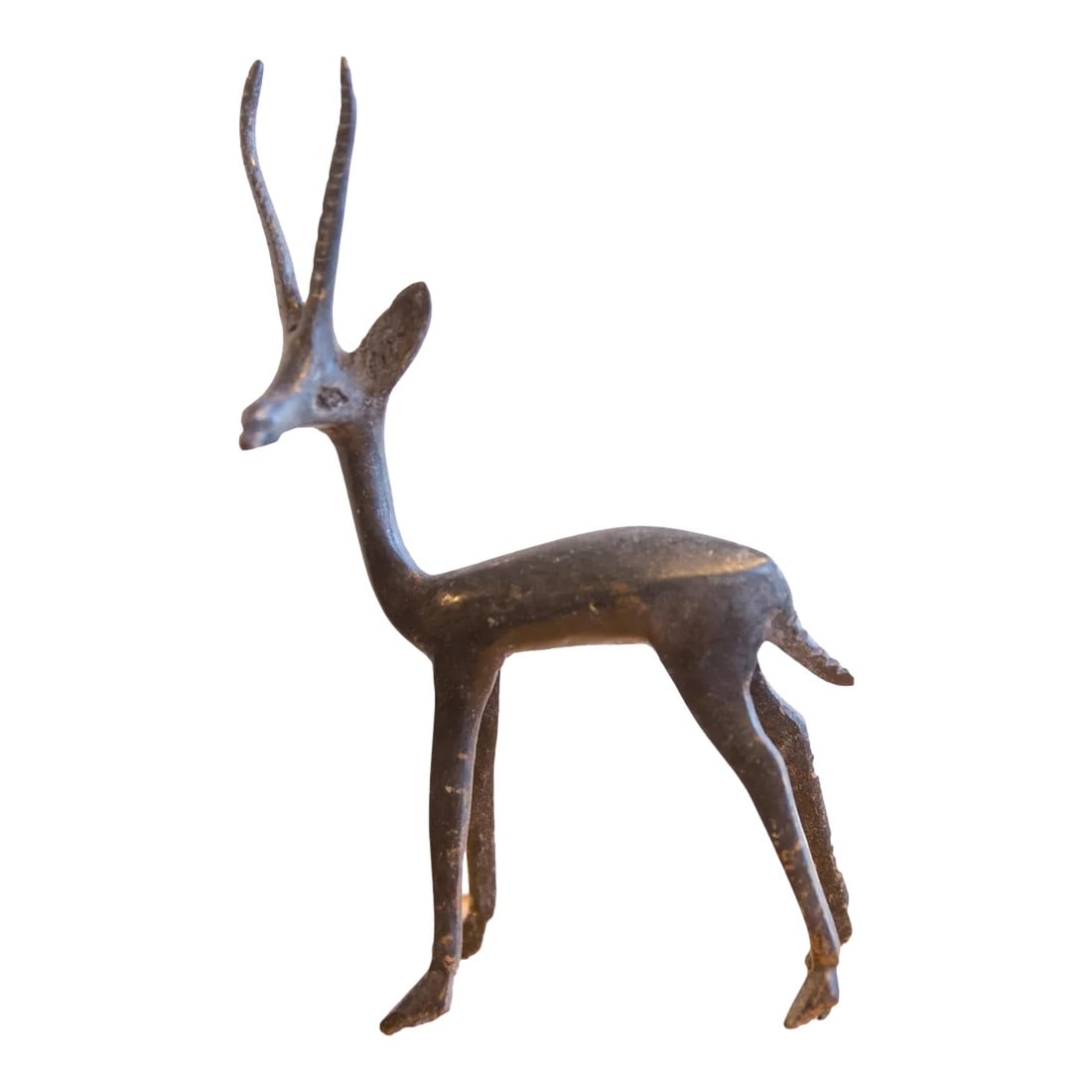 Vintage African Left Facing Gazelle With Dark Patina: :: Vintage handmade African left facing gazelle with dark patina. Circa 1960s though possibly older, this piece has such incredible handmade charm and no two are identical. Create a scene of wildlife