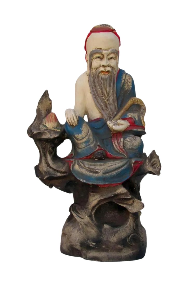 Chinese Hand Carving Camphor Wood Immortal of Longevity Statue: Camphor wood is famous for its fragrant smell and moth resistance character. This colorful Immortal of Longevity is made of camphor wood and carved in a round. He is sitting on the rock with a brush i