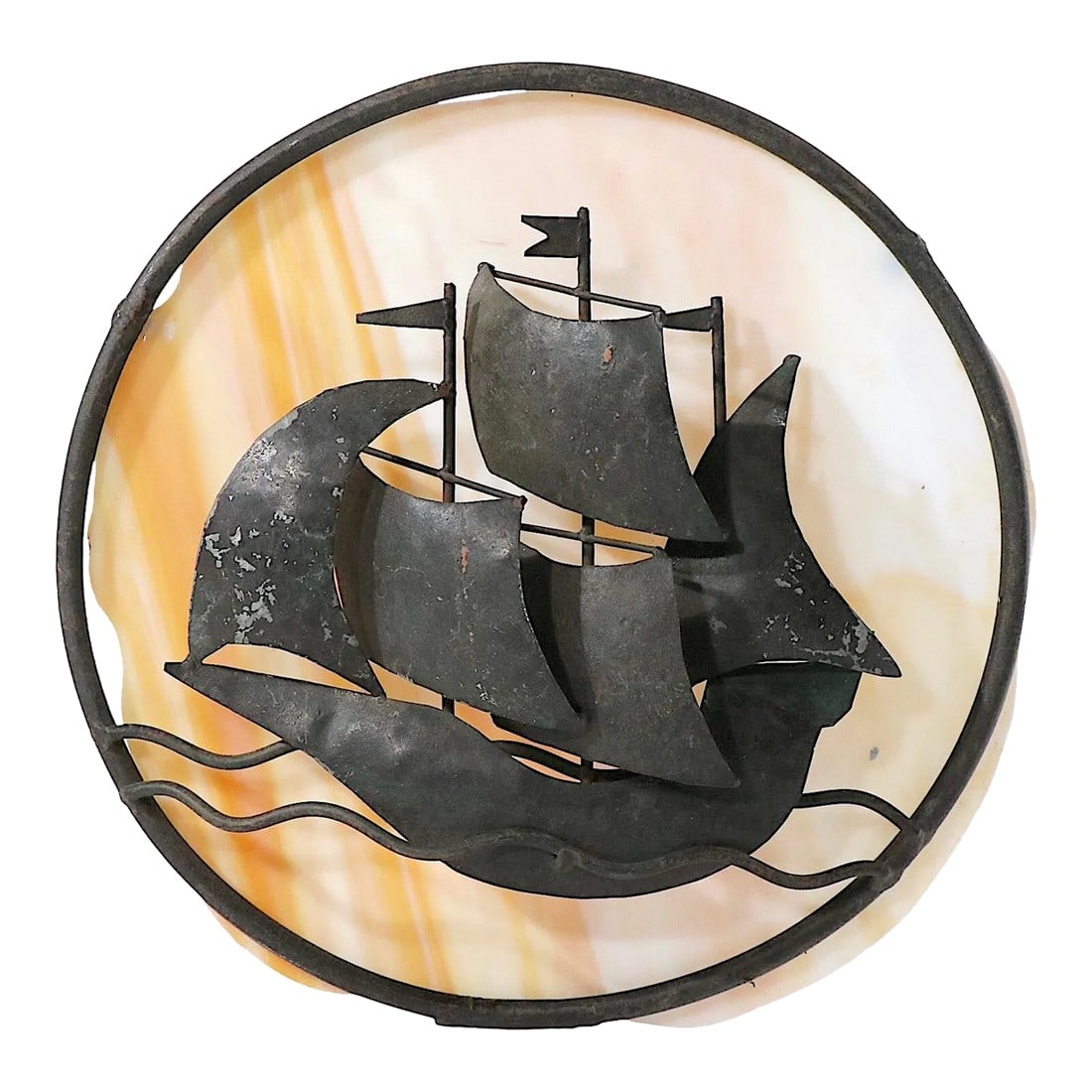 Arts and Crafts Wrought Iron and Slag Glass Sconce: Charming wrought iron and slag glass pin up sconce executed in the Arts and Crafts style circa 1900/ 1930's. The sconce is in very good, clean and working condition, rest to install and use. The slag