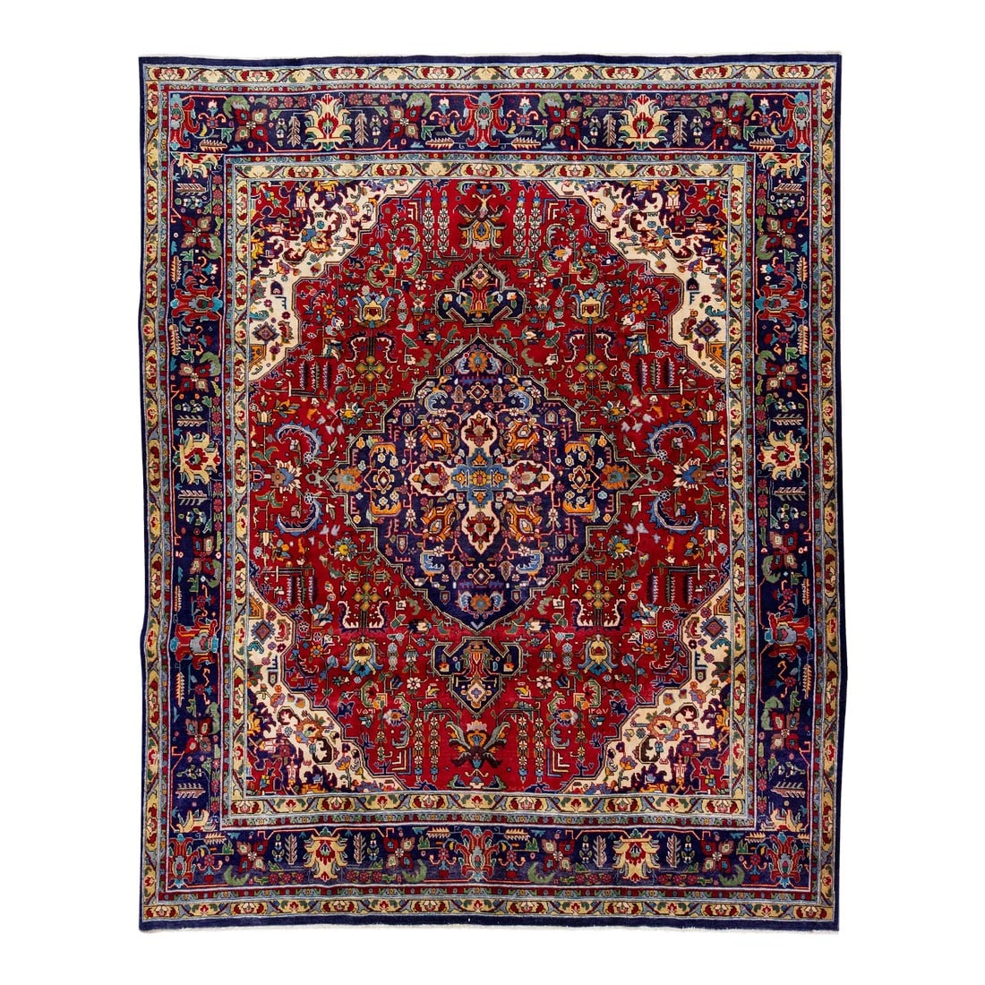 Handmade Antique Persian Tabriz Wool Rug With Multicolor Medallion Motif: Beautiful vintage Persian Tabriz hand-knotted wool rug with a red color field. This piece has a navy blue frame with multicolor accents in an all-over medallion design. This rug measures: 9'8" x