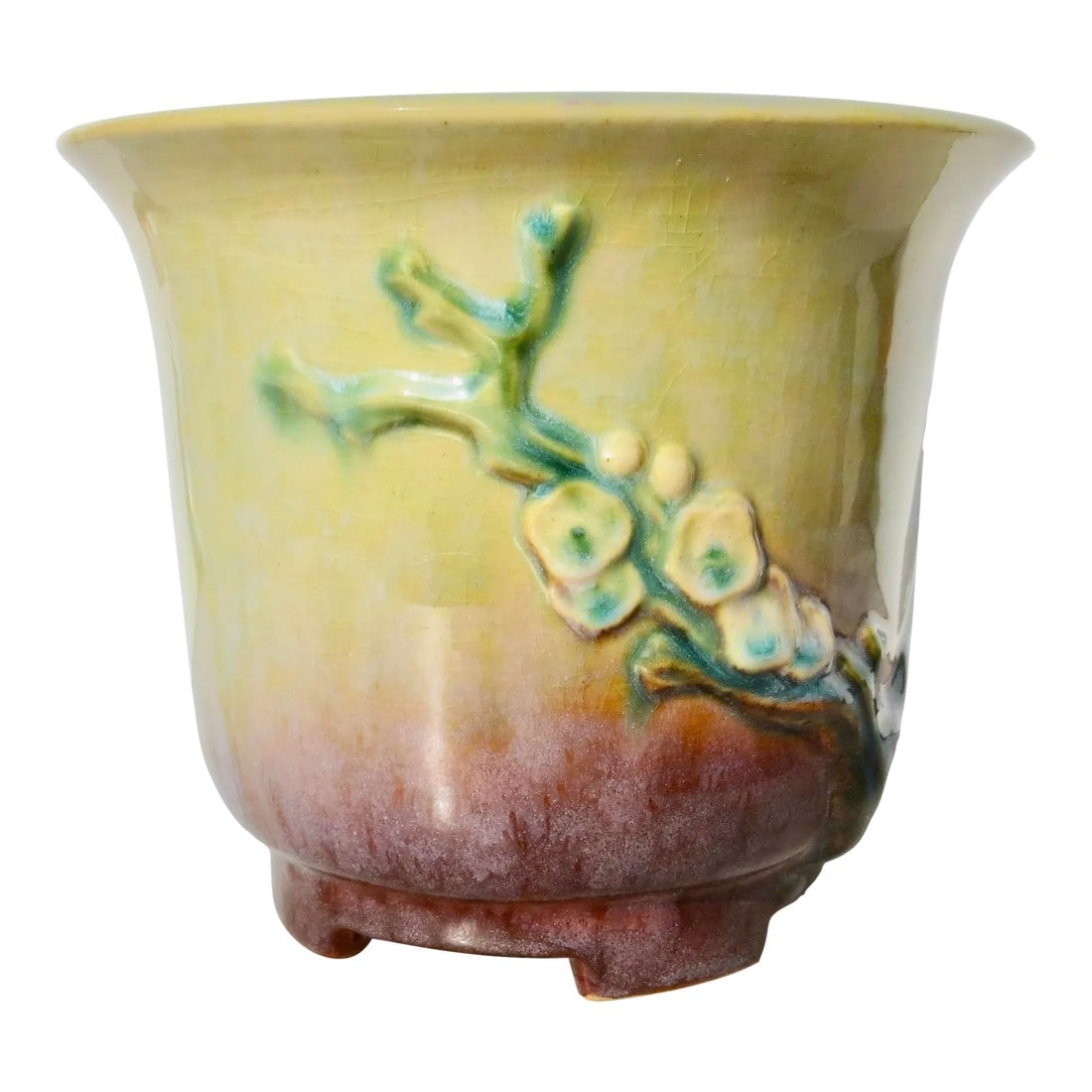 Roseville Art Deco Planter Circa 1930s': Beautifully shaded Roseville Art Deco planter in great shape, always used as a cache pot. Oriental Prunnis branches on each side with a smooth shifting of color from yellow to mauve at the base.