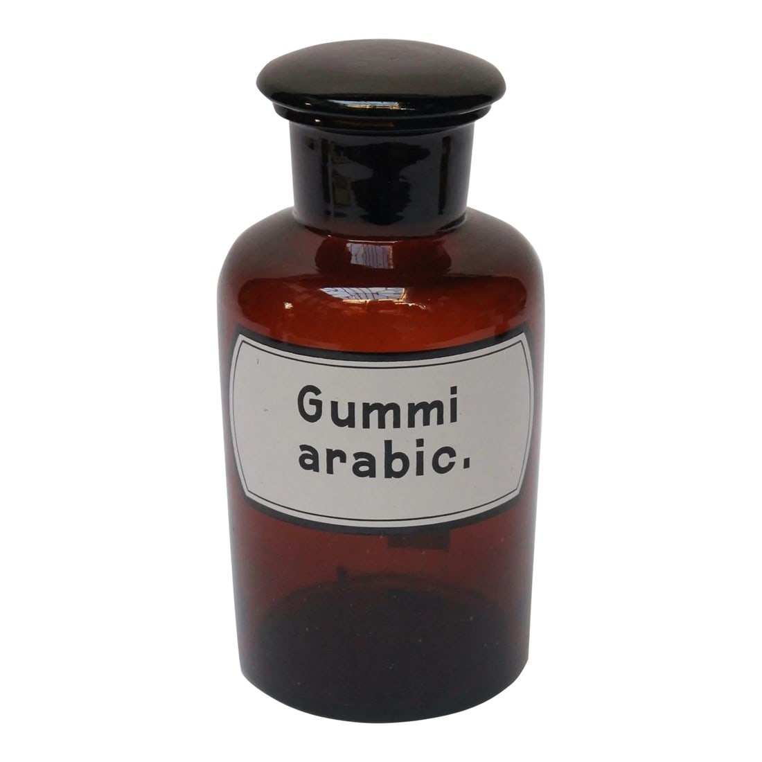 Vintage German Amber Glass "Gummi Arabicum" Apothecary Bottle: Gummi Arabic. (Gummi Arabicum / Acacia) pharmacy bottle/apothecary jar (circa late 1920s/early 1930s, Germany). Amber glass with button stopper and enamel label. Good, vintage condition light wear