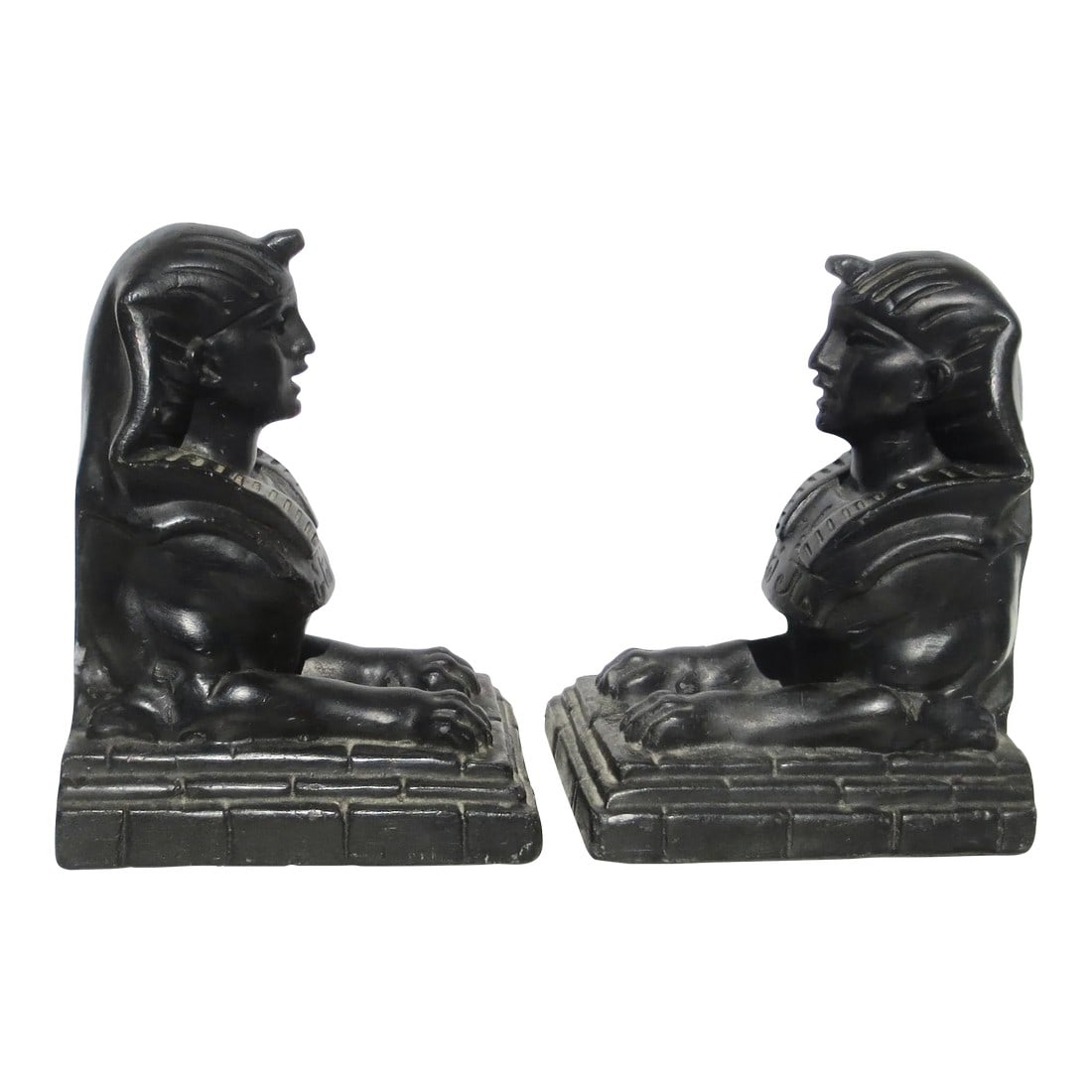 Egyptian Sphinx Resin Bookends: Mid-century Sphinx models from classic Egyptian architectural models. Black enamel over resin or plaster matrix. Hallmarked Depose 24, indicates a European/French source, likely French markets.