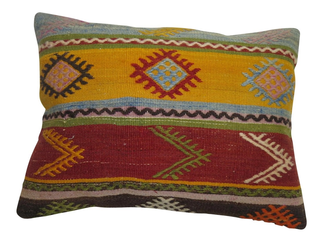 Large Vintage Kilim Pillow: Pillow made from a vintage turkish rug with cotton back. Zipper closure and foam insert provided. 15'' x 20'' Condition: Alterations: Original Condition Unaltered Imperfections: Some Imperfections Con