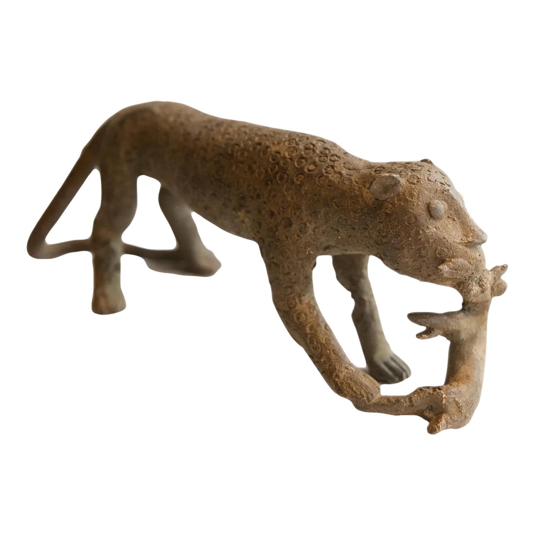 Vintage African Cheetah With Prey Sculpture: :: Vintage handmade African cheetah with prey sculpture. Circa late mid 20th century, each figure in this collection represents a different variation of protection and spirit used inside and outside o