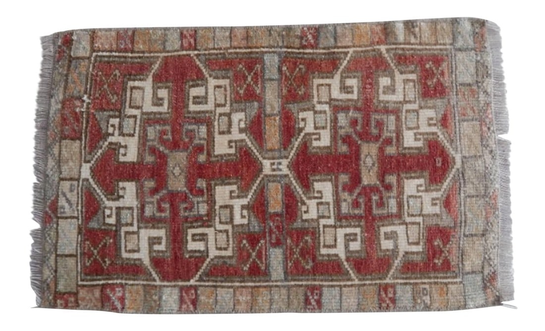 Distressed Low Pile Yastik Rug Faded Mat: Distressed low pile Yastik faded rug. Handwoven with high quality pure wool. Excellent condition. From TURKEY. Works well with all styles of home decor. Can also be used as a wall hanging**! Condition
