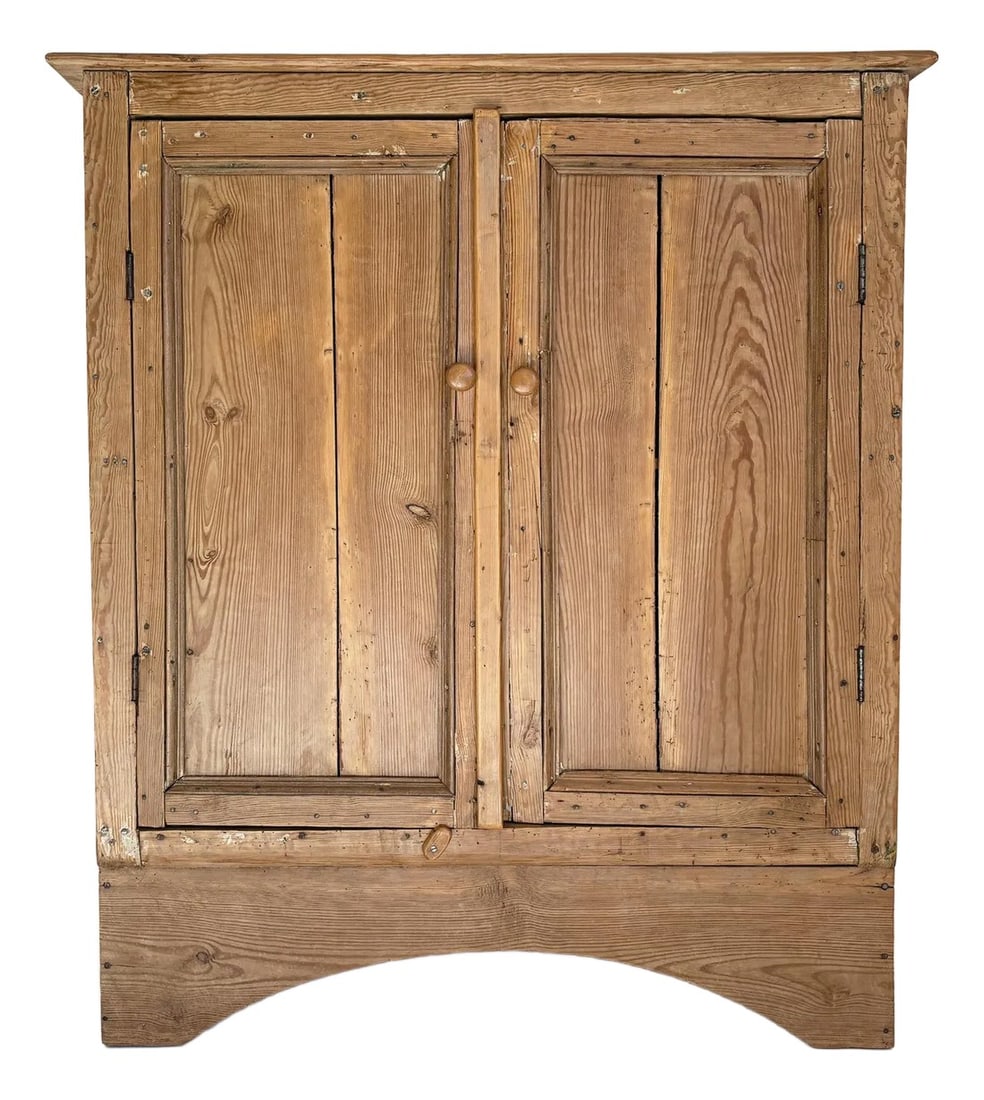 1900s Antique European Scrubbed Irish Pine Cabinet: This antique Irish scrubbed pine jelly cabinet is as charming as they come. The cabinet is circa 1900s and features warm, distressed natural wood tones with plenty of patina. The arched base provides