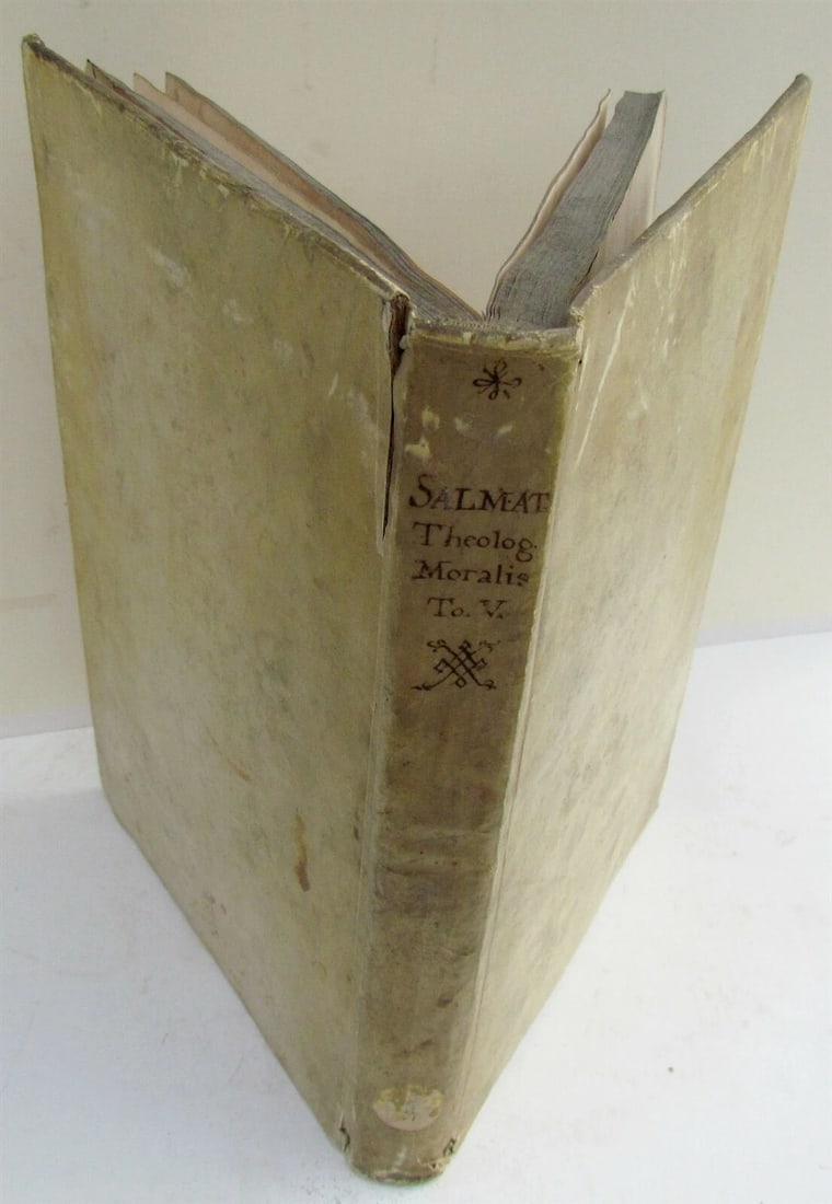 1715 VELLUM BOUND ANTIQUE FOLIO COLLEGII SALMANTICENSIS: Title: 1715 VELLUM BOUND ANTIQUE FOLIO COLLEGII SALMANTICENSIS Description: R.P.F. Gabrielis a S. Vincentio ... De iustitia, et iure, tum in communi ... Folio (8 1/2 by 12 1/4") VENICE, 1715 Some